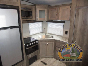 The huge pantry to the right of the kitchen gives you the storage you've been looking for in your RV. See the Keystone Sprinter 27FWML at Byerly RV in St. Louis, Missouri